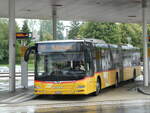 (253'681) - PostAuto Nordschweiz - BL 140'254/PID 10'831 - MAN am 12. August 2023 beim Bahnhof Laufen