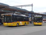 (215'134) - PostAuto Bern - BE 422'461 - MAN/Gppel (ex AVG Meiringen Nr. 61) + BE 535'079 - MAN/Gppel (ex Nr. 217; ex RBS Worblaufen Nr. 217) am 14. Mrz 2020 beim Bahnhof Gstaad
