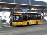 (232'256) - PostAuto Bern - BE 422'461 - MAN/Gppel (ex AVG Meiringen Nr. 61) am 22. Januar 2022 beim Bahnhof Gstaad