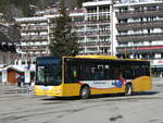 (232'831) - Grindelwaldbus, Grindelwald - Nr. 11/BE 261'865 - MAN/Gppel am 13. Februar 2022 beim Bahnhof Grindelwald