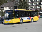 MAN/769986/233247---grindelwaldbus-grindelwald---nr (233'247) - Grindelwaldbus, Grindelwald - Nr. 16/BE 28'821 - MAN am 27. Februar 2022 beim Bahnhof Grindelwald