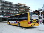 (244'014) - Grindelwaldbus, Grindelwald - Nr. 12/BE 356'085 - MAN am 18. Dezember 2022 beim Bahnhof Grindelwald