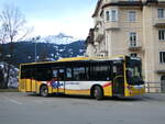 (246'207) - Grindelwaldbus, Grindelwald - Nr. 18/BE 382'871 - MAN/Gppel am 17. Februar 2023 beim Bahnhof Grindelwald