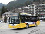 (246'219) - Grindelwaldbus, Grindelwald - Nr. 16/BE 28'821 - MAN am 17. Februar 2023 beim Bahnhof Grindelwald