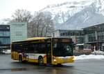 (257'448) - Grindelwaldbus, Grindelwald - Nr. 14/BE 202'568 - MAN/Gppel am 4. Dezember 2023 beim Bahnhof Interlaken Ost