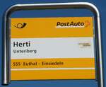 (253'916) - PostAuto-Haltestellenschild - Unteriberg, Herti - am 19. August 2023