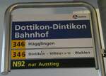 (256'677) - A-welle/PostAuto-Haltestellenschild - Dottikon-Dintikon, Bahnhof - am 4. November 2023