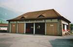 (006'317) - Garage der Automobil-Verkehr Frutigen-Adelboden am 24. Juli 1990 beim Bahnhof Frutigen