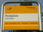 (134'540) - PostAuto-Haltestellenschild - Interlaken, Postplatz - am 27.