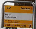(257'455) - PostAuto-Haltestellenschild - Hasliberg Reuti, Dorf - am 5. Dezember 2023