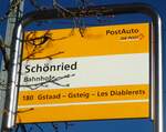 (137'010) - PostAuto-Haltestellenschild - Schnried, Bahnhof - am 25.