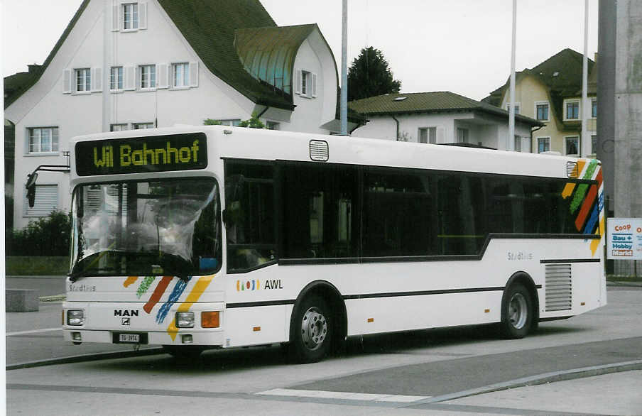 (023'512) - AWL Littenheid - TG 3974 - MAN/Lauber am 14. Juni 1998 beim Bahnhof Wil