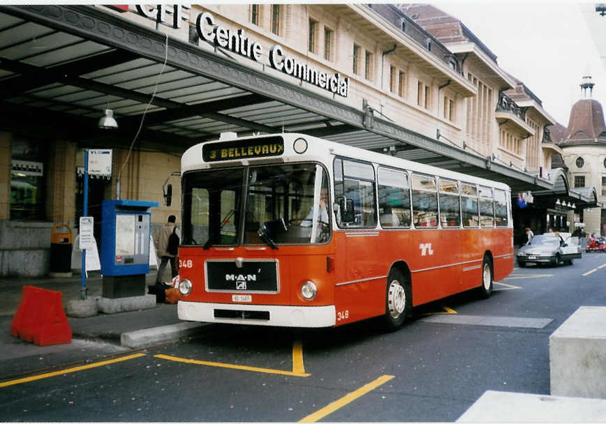 (030'311) - TL Lausanne - Nr. 348/VD 1487 - MAN am 21. Mrz 1999 beim Bahnhof Lausanne