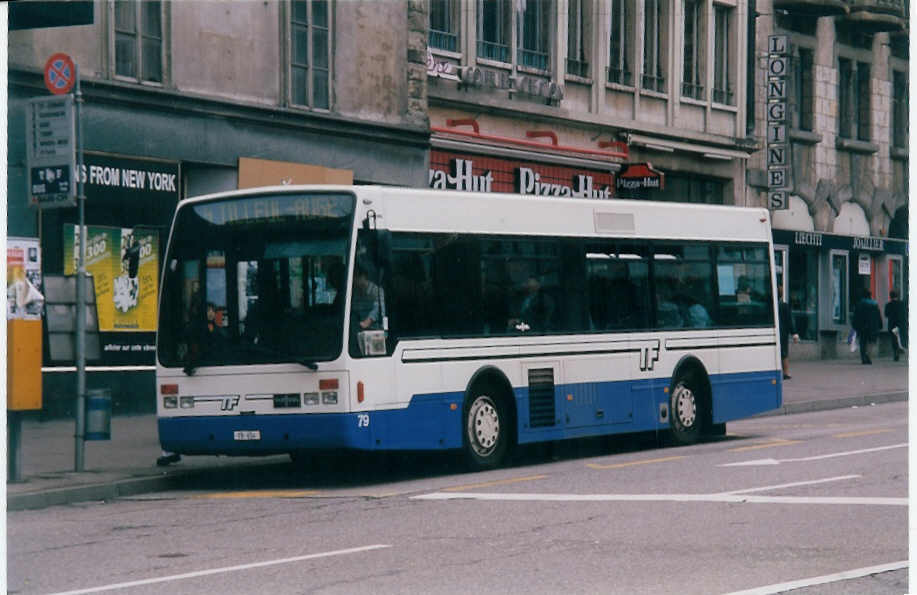 (030'717) - TF Fribourg - Nr. 79/FR 654 - Van Hool am 3. April 1999 beim Bahnhof Fribourg