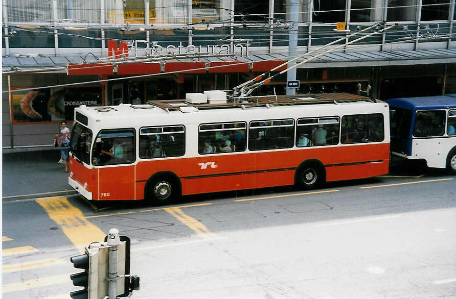 (033'635) - TL Lausanne - Nr. 765 - NAW/Lauber Trolleybus am 7. Juli 1999 in Lausanne, Place Riponne
