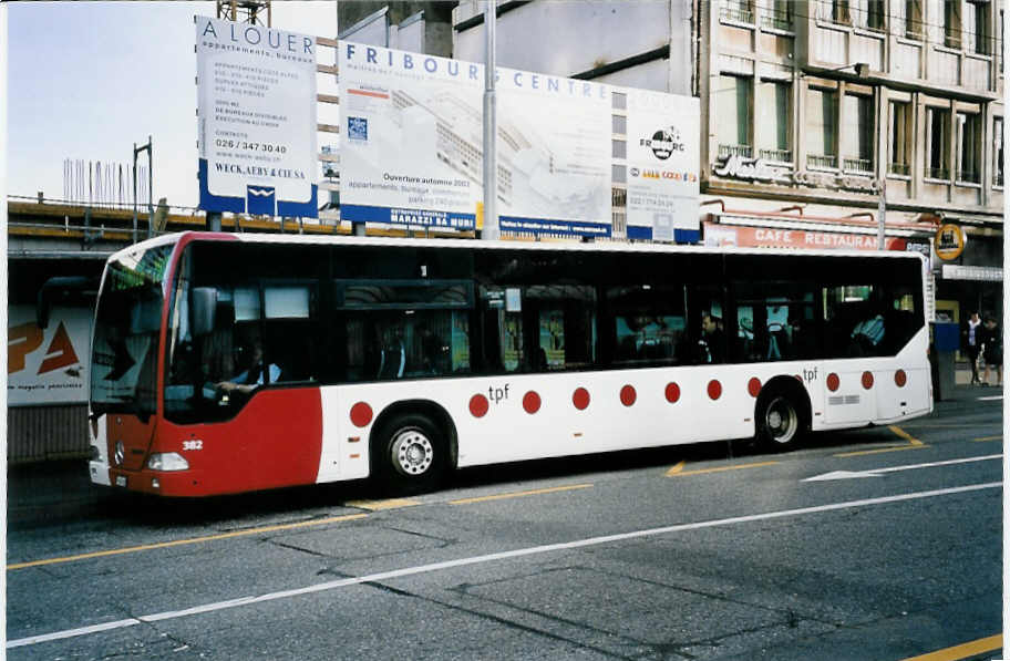(052'437) - TPF Fribourg - Nr. 382/FR 300'383 - Mercedes am 17. Mrz 2002 beim Bahnhof Fribourg