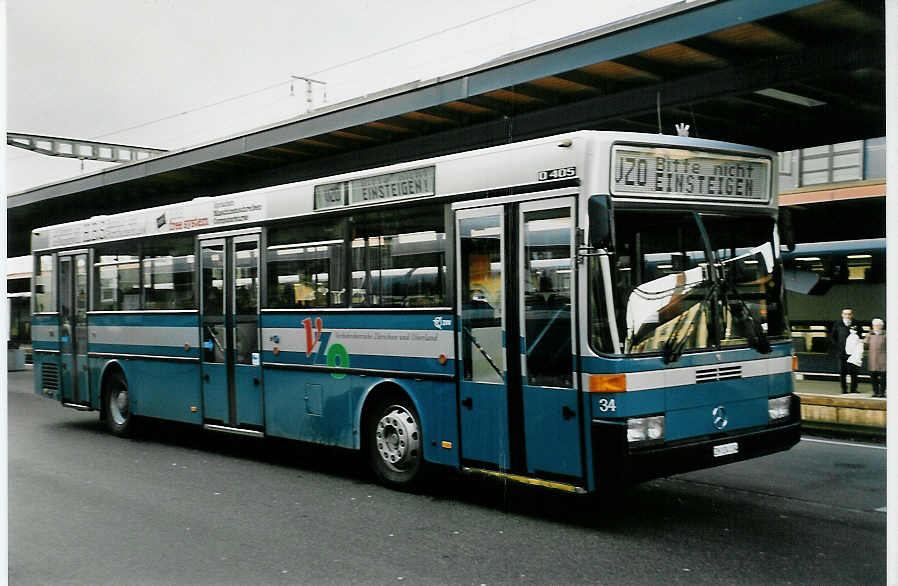 (052'610) - VZO Grningen - Nr. 34/ZH 124'134 - Mercedes am 23. Mrz 2002 beim Bahnhof Uster