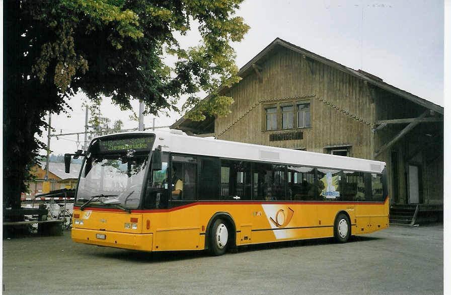 (068'603) - PostAuto Linth-SChwyz-Glarus - SG 273'333 - Van Hool (ex P 25'400) am 19. Juni 2004 beim Bahnhof Uznach