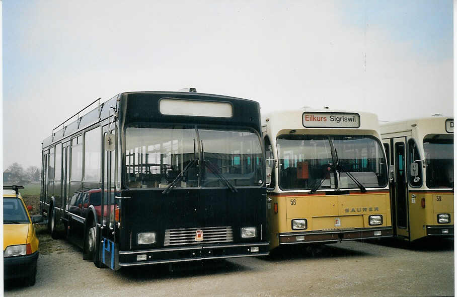 (073'204) - STI Thun - Nr. 27 - Volvo/R&J (ex SAT Thun Nr. 27) + Nr. 58 - Saurer/R&J am 12. Dezember 2004 in Belp, ABAG