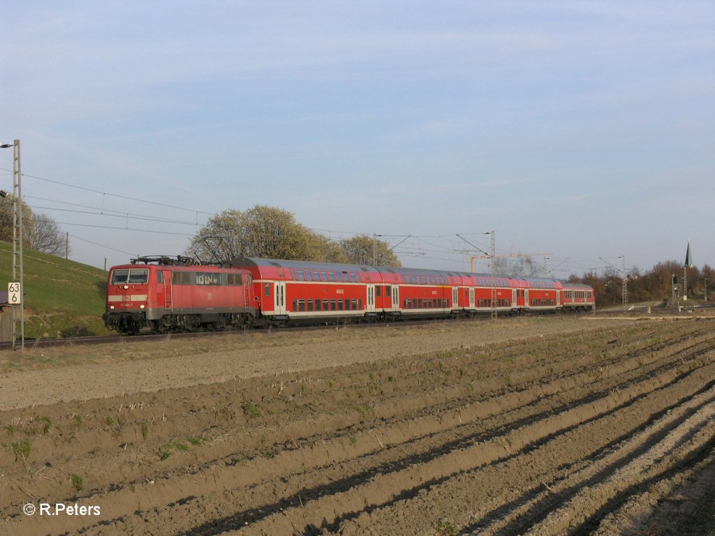 111 066-7 zieht die RB59182 M�nchen - Ingolstadt Nord bei Fahlenbach. 24.03.11
