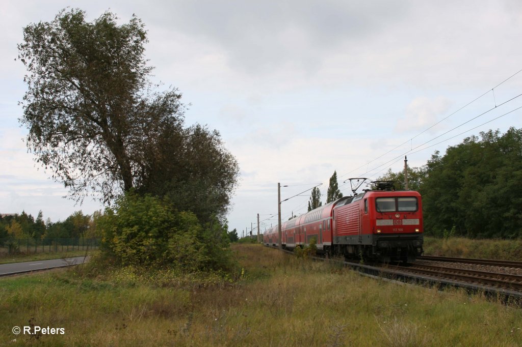 112 106 mit dem RE18113 Magdeburg - Eisenh�ttenstadt kurz vorm Ziel. 05.10.11