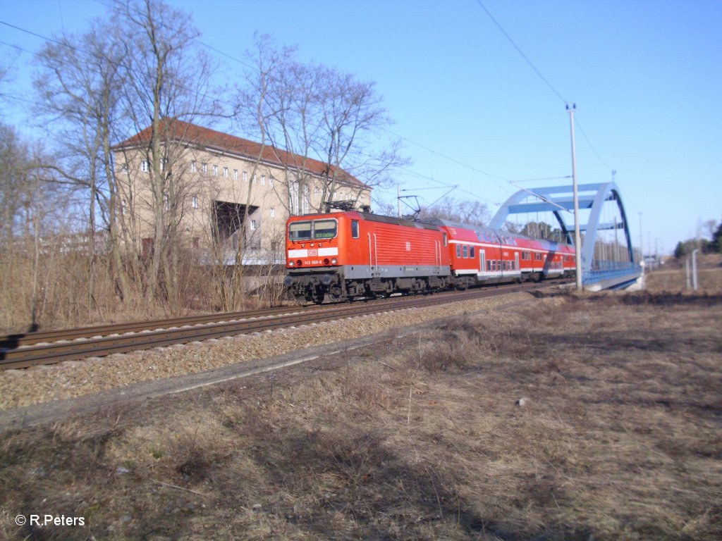 143 868-9 verl�sst Eisenh�ttenstadt mit der RB11 Cottbus. 07.03.11
