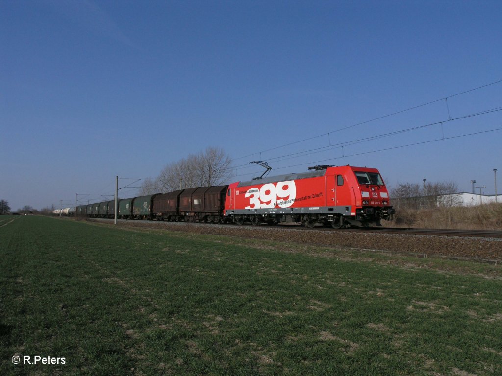 185 399-3 mit gemischten G�terzug bei Podelwitz. 29.03.11