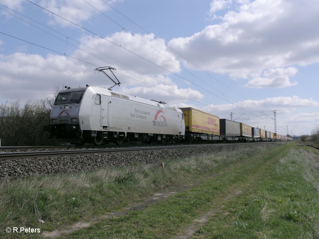 185 539-1 zieht den DHL-Zug bei Th�ngersheim. 10.04.10