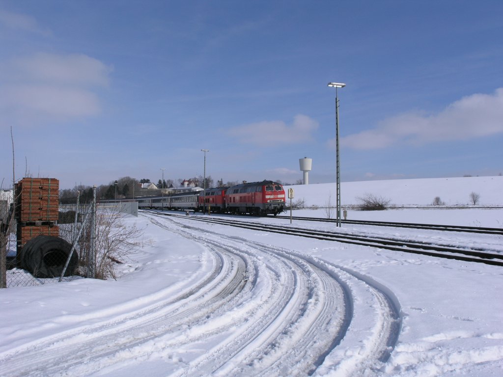218 428-1 + 418-2 verlassen Buchloe mit den EC194 Z�rich. 25.02.09
