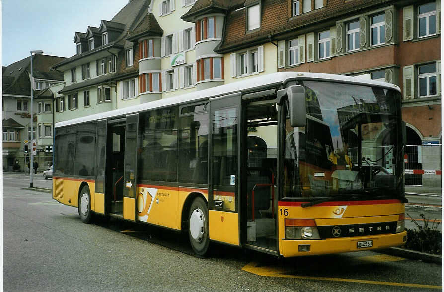 (083'036) - PostAuto Aargau - Nr. 16/AG 428'667 - Setra (ex P 25'602) am 18. Februar 2006 beim Bahnhof Brugg