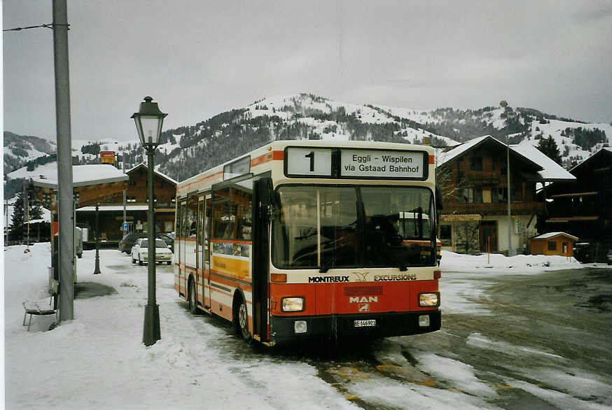 (083'135) - MOB Montreux - Nr. 27/BE 146'921 - MAN (ex BSF Hochdorf) am 19. Februar 2006 beim Bahnhof Gstaad