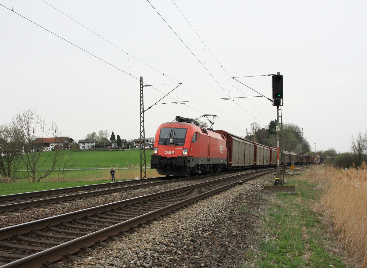 1116 019-9 ist am 3. April 2014 bei Weisham auf dem Weg in Richtung Salzburg.