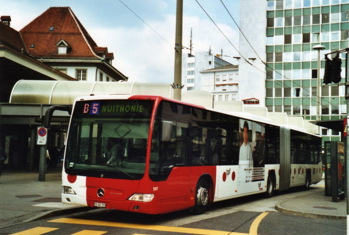 (126'408) - TPF Fribourg - Nr. 597/FR 300'399 - Mercedes am 19. Mai 2010 beim Bahnhof Fribourg