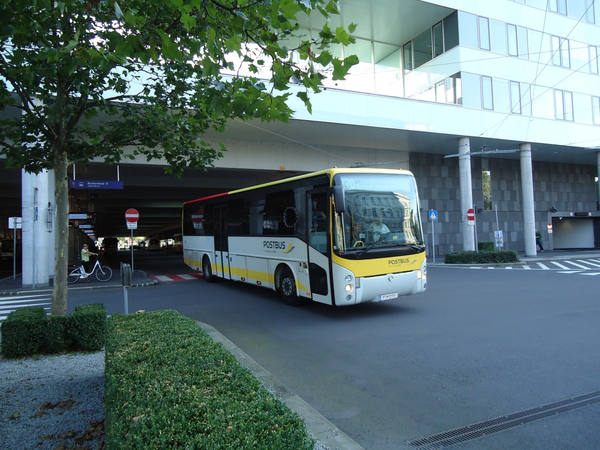 (128'560) - PostBus - PT 12'111 - Irisbus am 10. August 2010 beim Bahnhof Linz