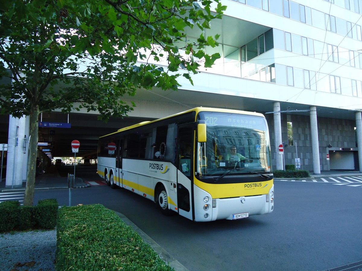 (128'566) - PostBus - BD 12'713 - Irisbus am 10. August 2010 beim Bahnhof Linz