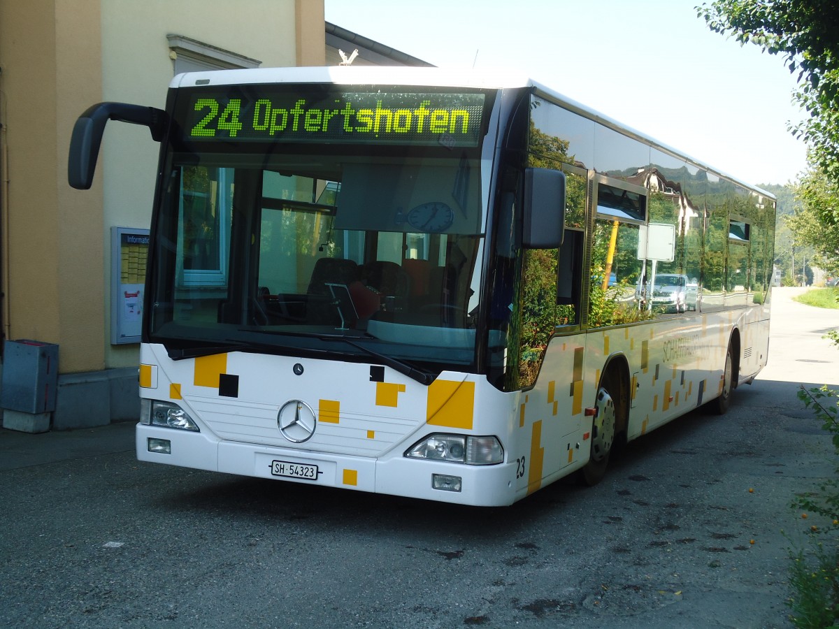 (129'014) - SB Schaffhausen - Nr. 23/SH 54'323 - Mercedes (ex Rattin, Neuhausen Nr. 23) am 22. August 2010 beim Bahnhof Thayngen