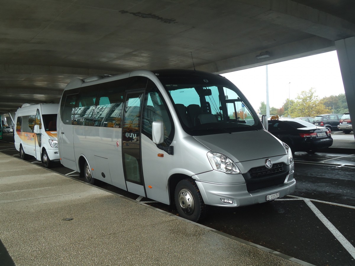 (147'543) - Aus der Schweiz: Autovermietung-Basel, Basel - BL 133'257 - Irisbus/UNVI am 20. Oktober 2013 in Basel-Mulhouse, EuroAirport