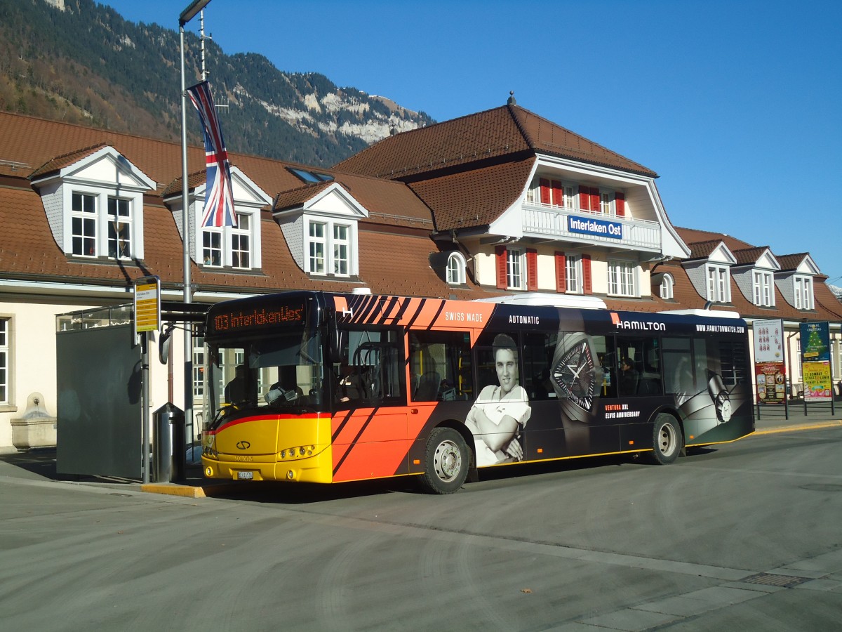 (148'250) - PostAuto Bern - BE 610'538 - Solaris am 8. Dezember 2013 beim Bahnhof Interlaken Ost