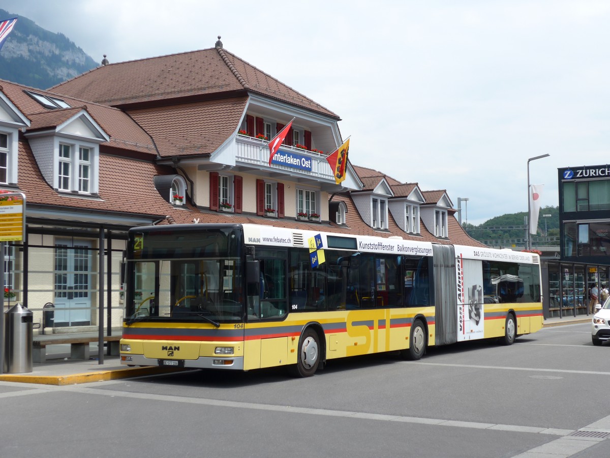 (151'537) - STI Thun - Nr. 104/BE 577'104 - MAN am 15. Juni 2014 beim Bahnhof Interlaken Ost