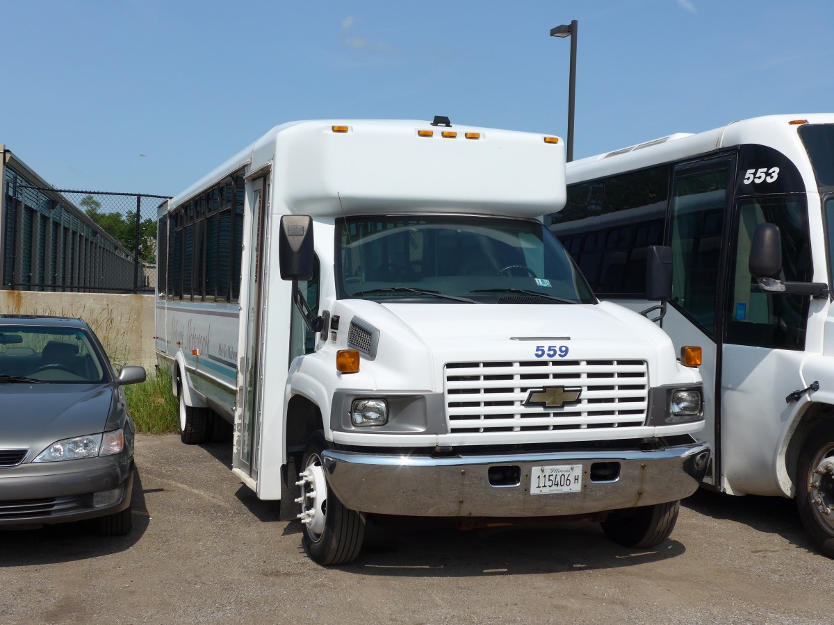 (152'993) - Midwest Motorcoach, Gurnee - Nr. 559/115'406 H - Chevrolet am 17. Juli 2014 in Gurnee, Garage