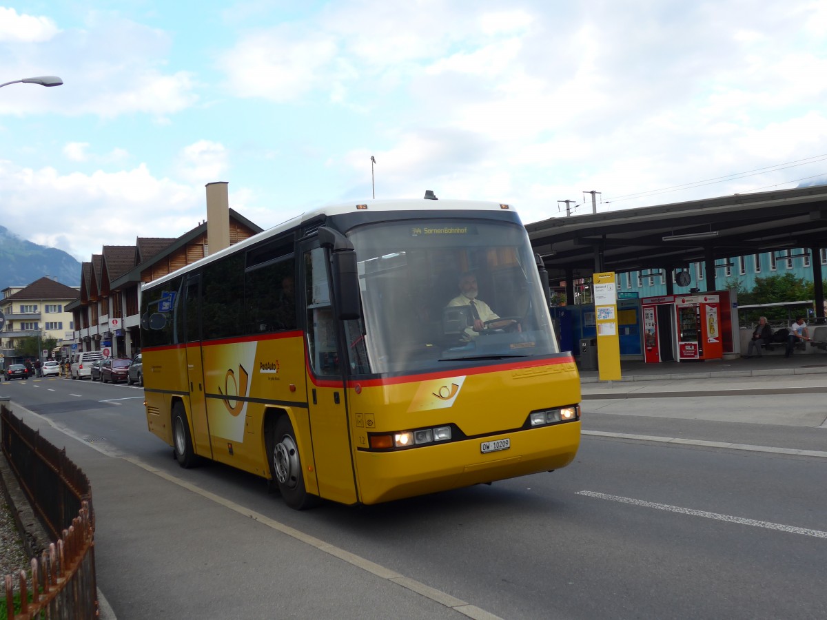 (154'662) - Dillier, Sarnen - Nr. 12/OW 10'209 - Neoplan am 30. August 2014 beim Bahnhof Sarnen