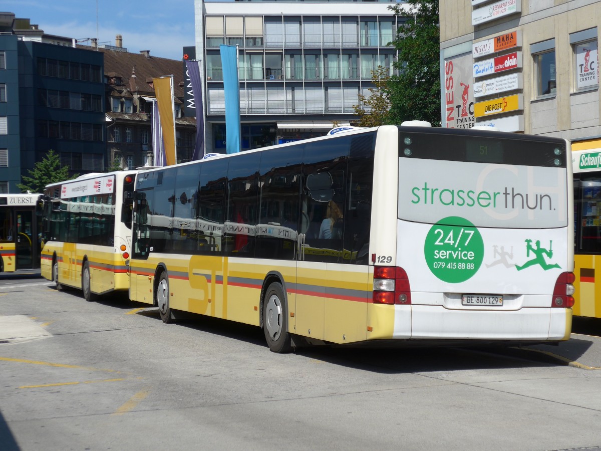 (154'875) - STI Thun - Nr. 129/BE 800'129 - MAN am 4. September 2014 beim Bahnhof Thun