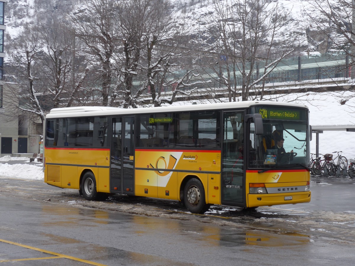 (158'018) - PostAuto Wallis - VS 241'967 - Setra am 28. Dezember 2014 beim Bahnhof Brig