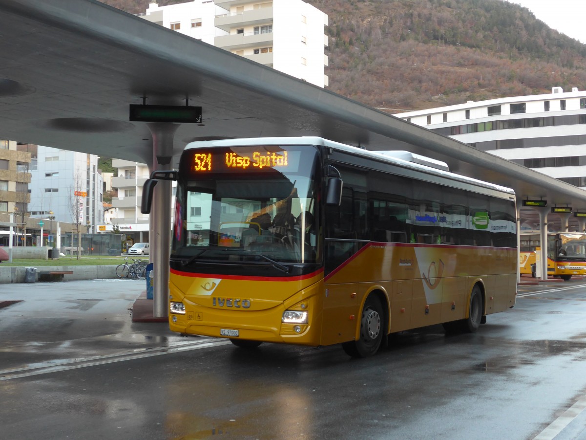 (158'224) - BUS-trans, Visp - VS 97'000 - Iveco am 4. Januar 2015 beim Bahnhof Visp