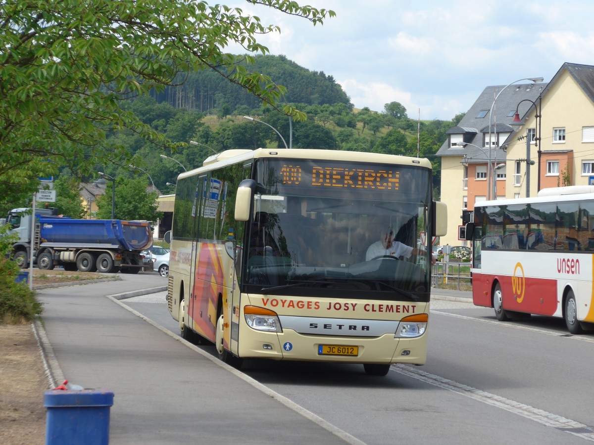 (162'619) - Clement, Bourglinster - JC 6012 - Setra am 25. Juni 2015 beim Bahnhof Diekirch