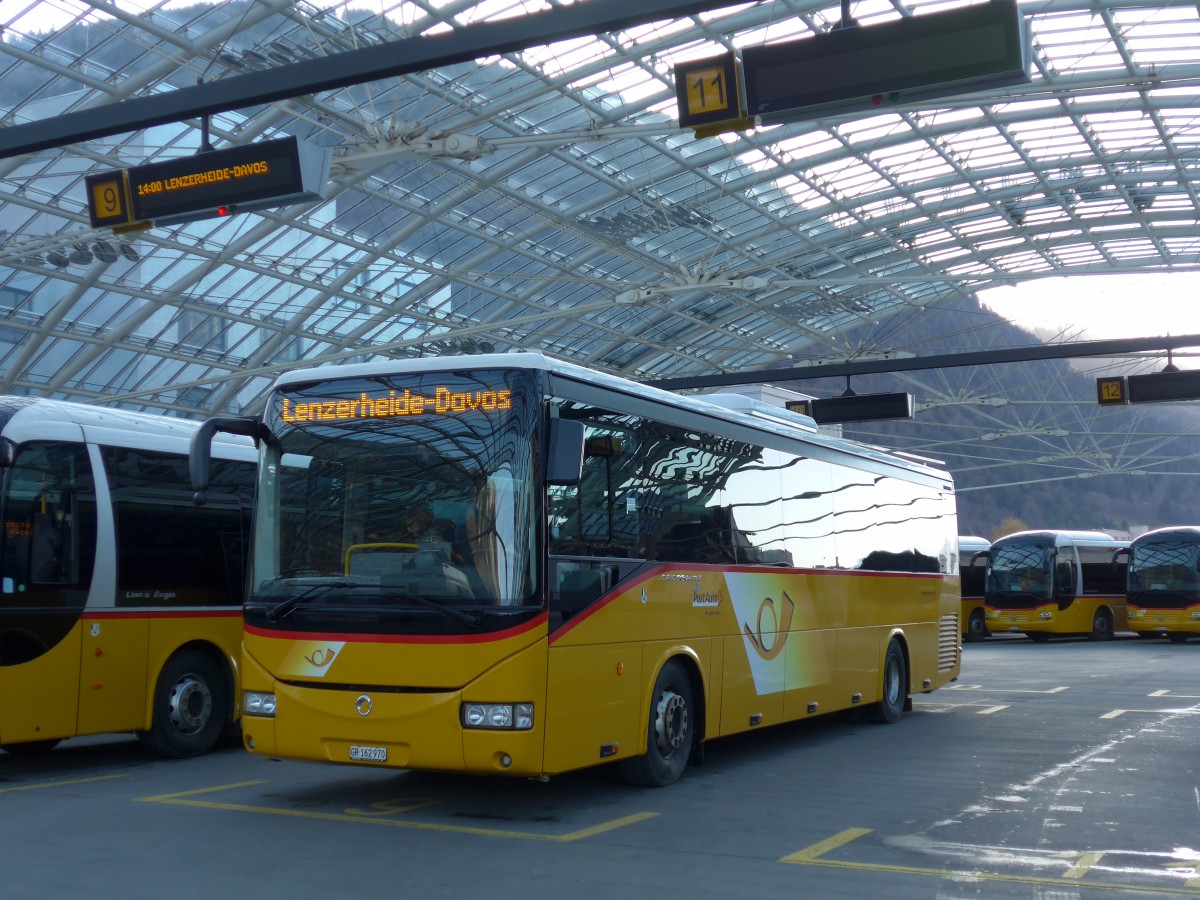 (167'838) - PostAuto Graubnden - GR 162'970 - Irisbus am 19. Dezember 2015 in Chur, Postautostation