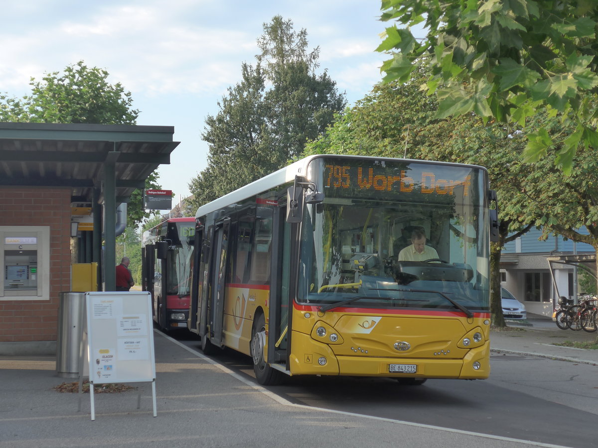 (182'503) - PostAuto Bern - Nr. 215/BE 843'215 - Heuliez am 2. August 2017 beim Bahnhof Rubigen