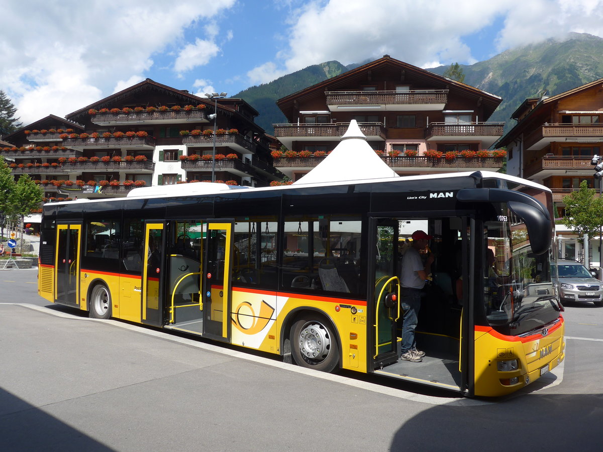 (182'780) - PostAuto Graubnden - GR 168'856 - MAN am 5. August 2017 beim Bahnhof Klosters