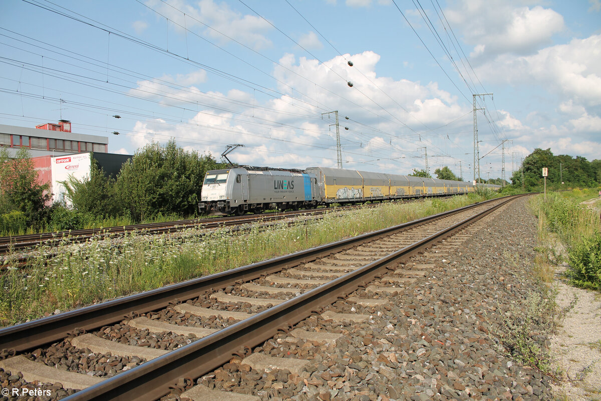 186 455-2 zieht mit einem ARS Altmann durch Nürnberg Hohe Marter. 24.07.24