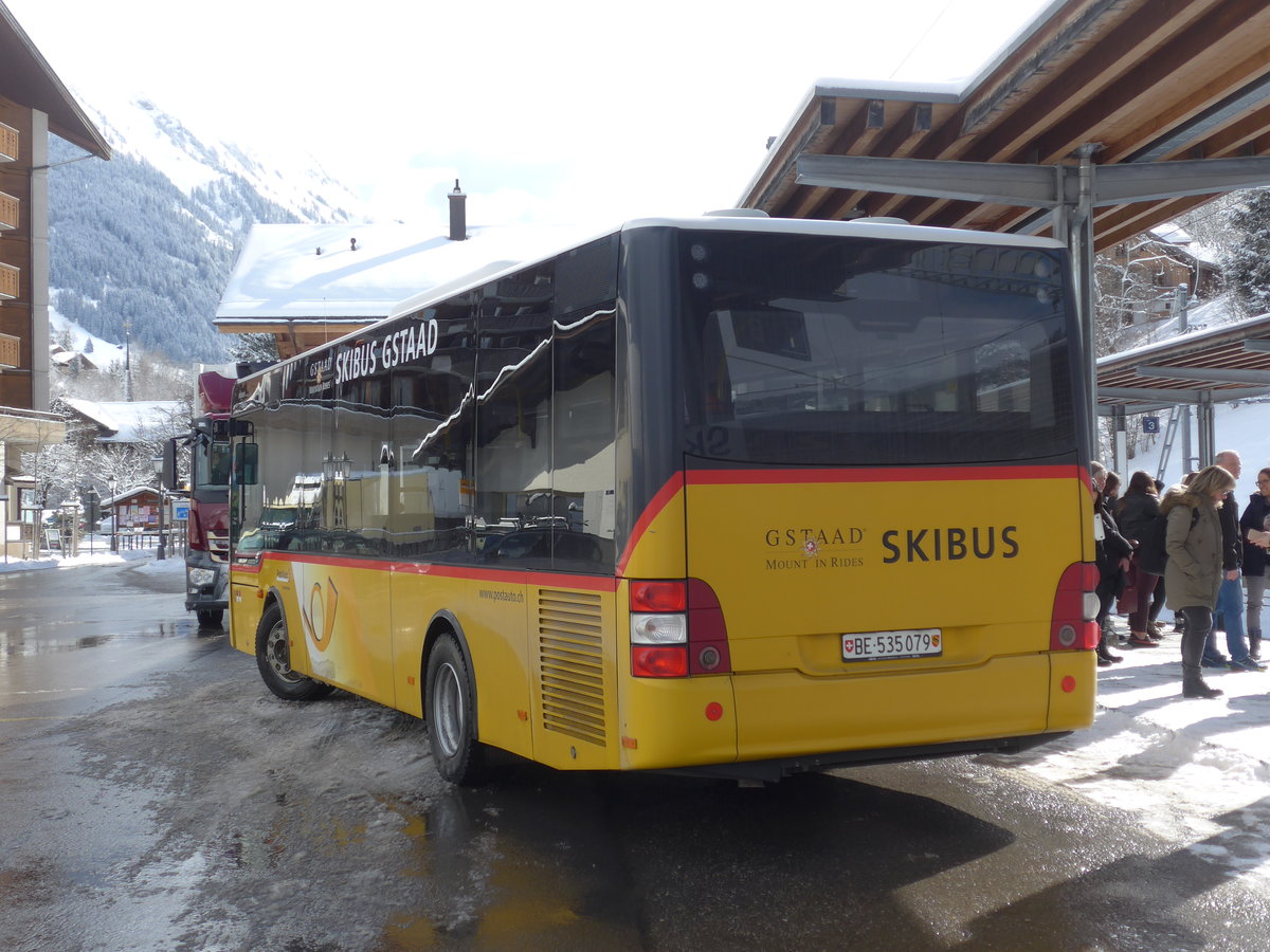 (188'475) - PostAuto Bern - BE 535'079 - MAN/Gppel (ex Nr. 217; ex RBS Worblaufen Nr. 217) am 12. Februar 2018 beim Bahnhof Gstaad